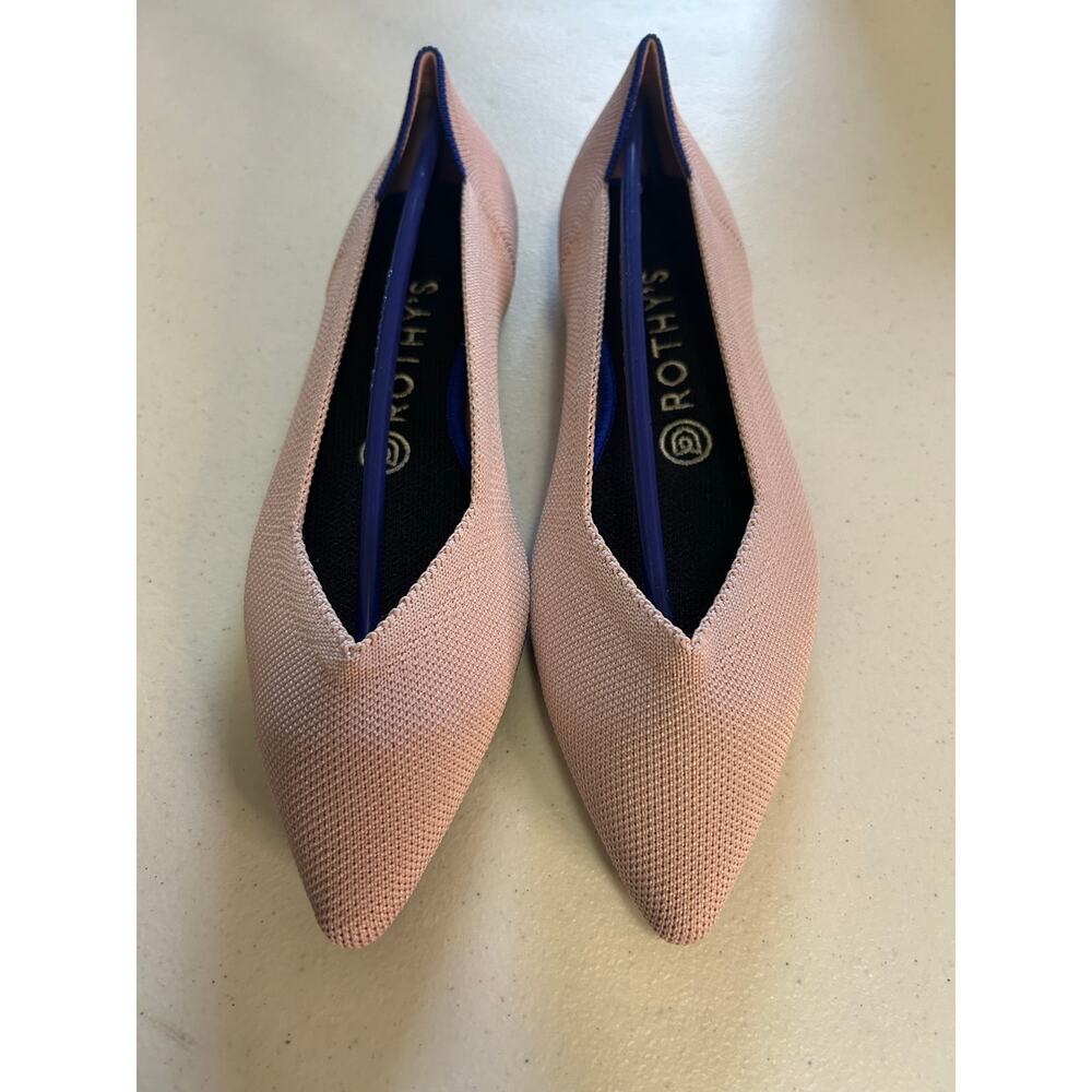 New in box Rothy’s “The Point” flats in a soft blush pink with blue trim. Size 8
